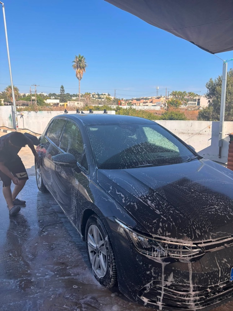 Black VW hand washed and covered in suds at GlossLab Chlorakas