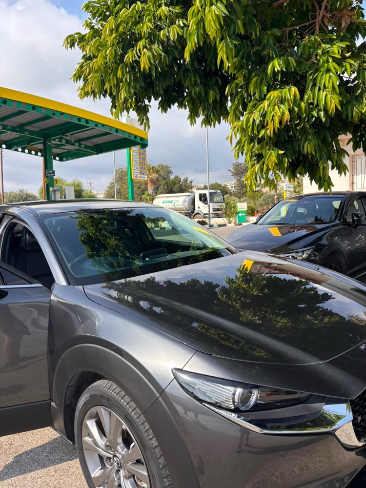 Customer cars waiting at the StarOil forecourt in Chlorakas, Paphos